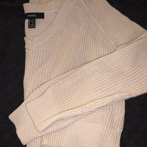 Light tan sweater, never been worn, no snags, or stain. Very good quality.